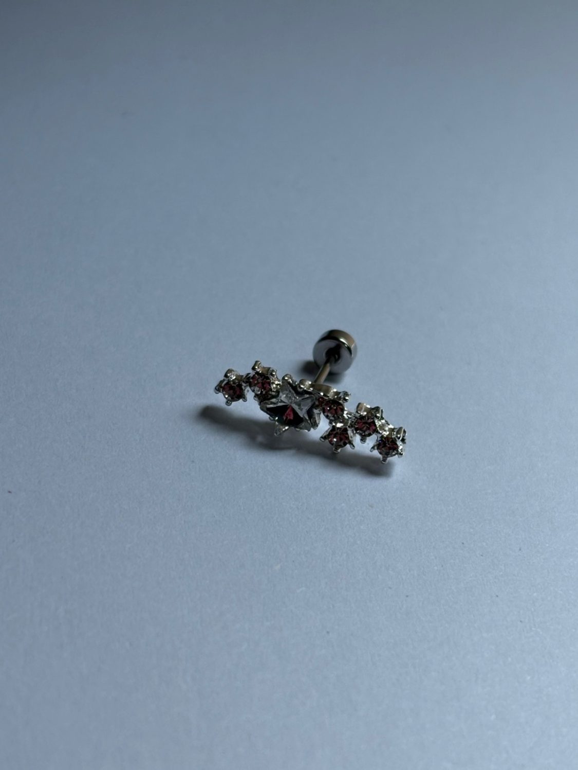 Piercing estrellas plateada